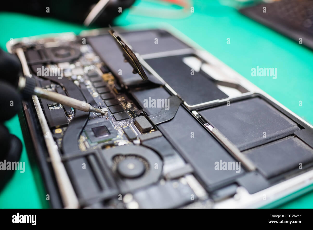 View of Soldering computer board laptop repair hi-res stock photography and ...