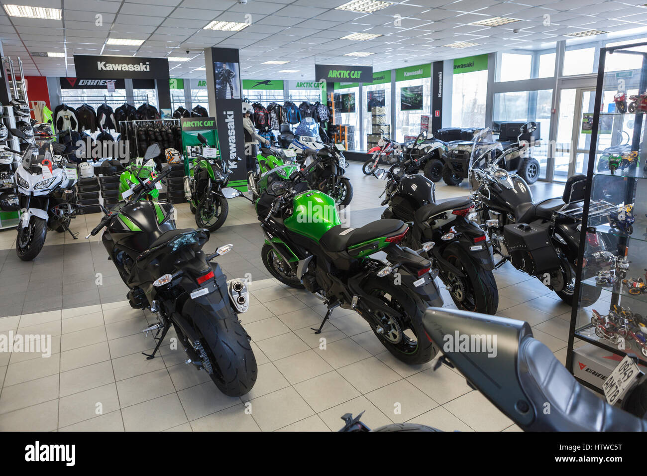 ST. PETERSBURG, RUSSIA - CIRCA FEB, 2017: New street motorbikes of Kawasaki brand are on sale in motorcycle store. Official dealership of Kawasaki and Stock Photo -