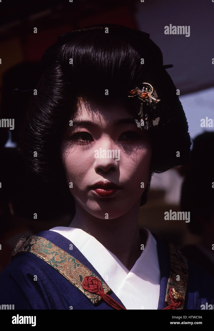 Geisha in Asakusa district of Tokyo, Japan.  The word consists of two kanji characters, (gei) meaning 'art' and (sha) meaning 'person' or 'doer'. The Stock Photo