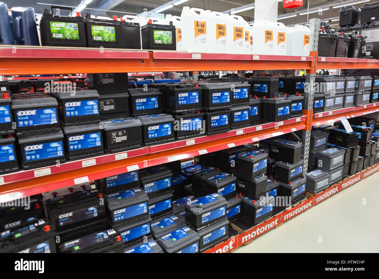 LAPPEENRANTA, FINLAND - CIRCA FEB, 2017: A lot of new batteries for  vehicles are on the racks of car accessories shop. The Motonet is a large  chain re Stock Photo - Alamy