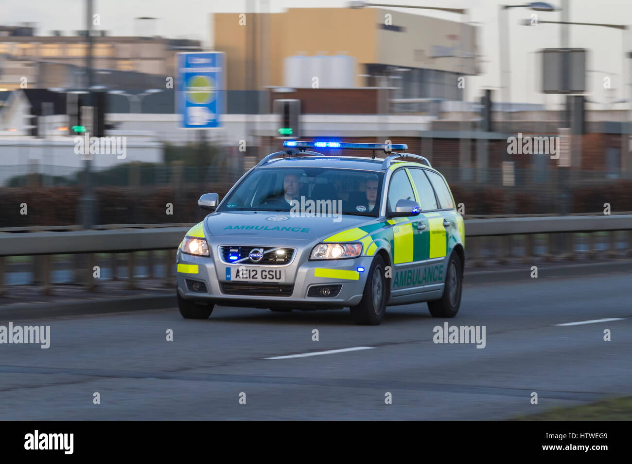 London Ambulance Service vehicle responding with blue lights Stock Photo