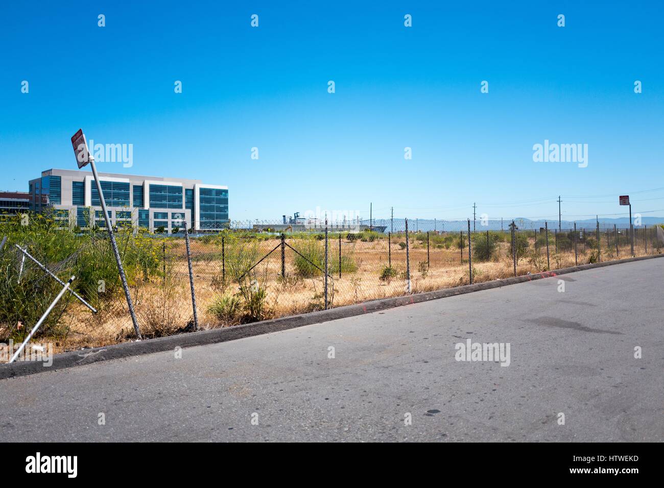 Site of the Golden State Warriors basketball team's new stadium, Chase Center, as it appeared in June of 2016, before construction of the stadium had begun, in the Mission Bay neighborhood of San Francisco, California, June 27, 2016. Stock Photo