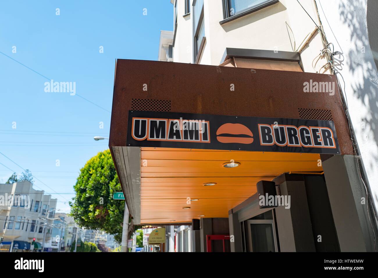 Signage for Umami Burger restaurant in the Cow Hollow neighborhood of San Francisco, California, August 28, 2016. Umami Burger is a popular West Coast chain which features burgers that highlight the umami taste sensation. Stock Photo