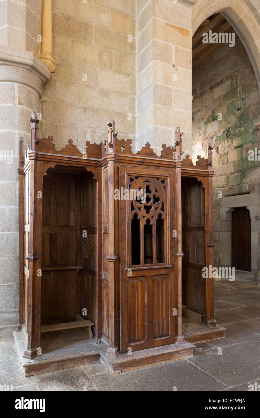 Confessional inside the Parish Church of Notre-Dame de Plouguiel, France-- The architect of the church was Alphonse Guepin and the church was built by Stock Photo