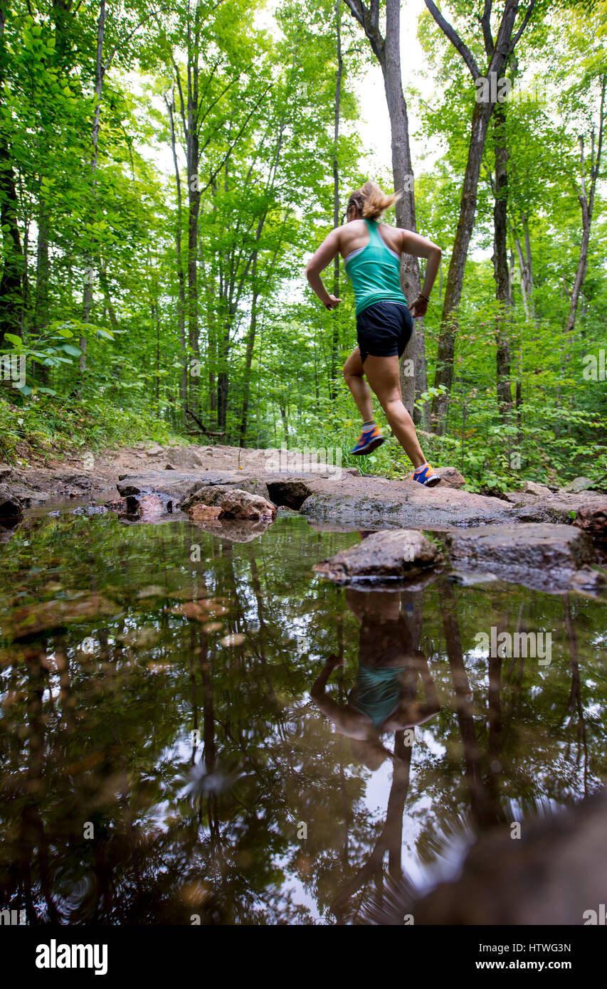 Woman running park legs hi-res stock photography and images - Alamy