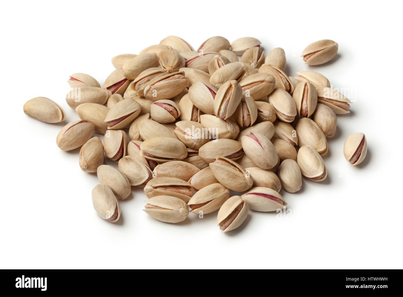 Heap of unshelled pistachio nuts on white background Stock Photo