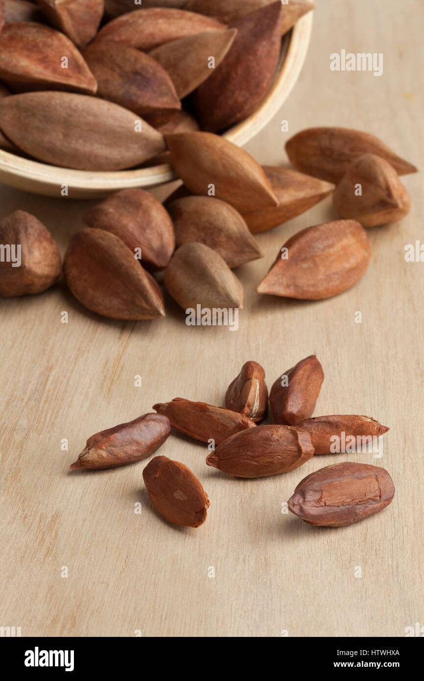 Shelled and unshelled pili nuts from the Philippines Stock Photo