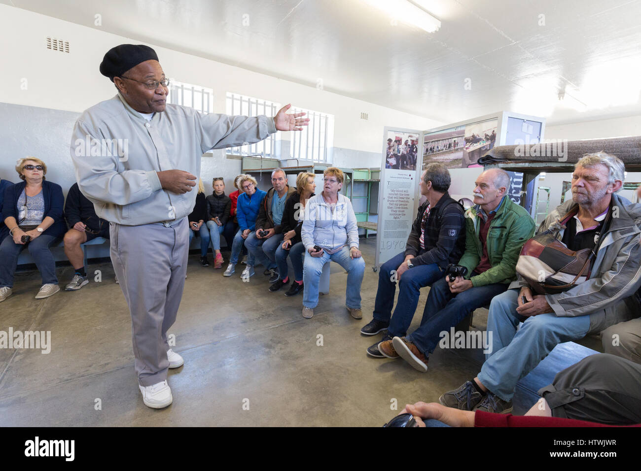 Robben Island Cape Town South Africa - Tourists on the Prison tour with guide, former inmate Ntando Mbatha Stock Photo