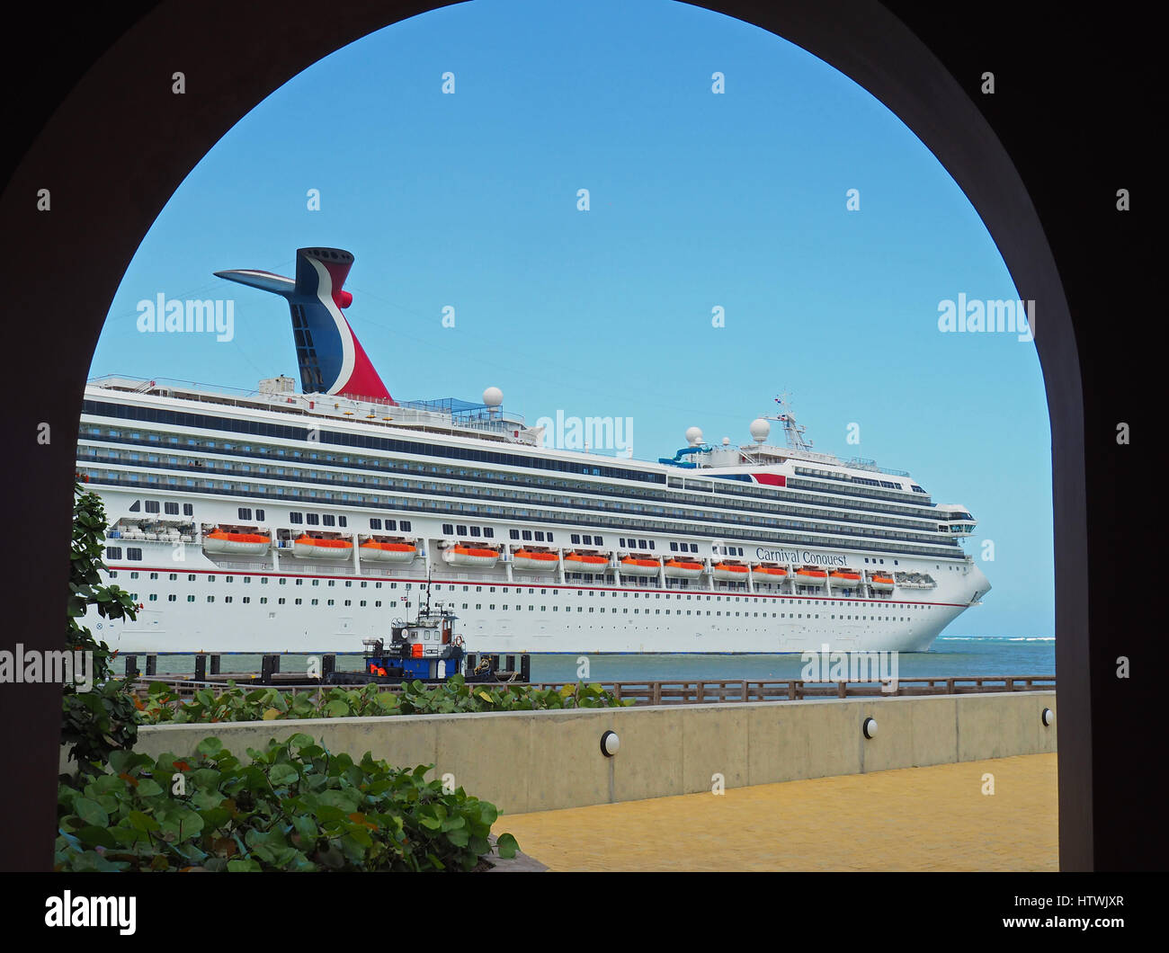 Carnival Conquest cruise ship at port of Amber Cove in Dominican Republic. Stock Photo