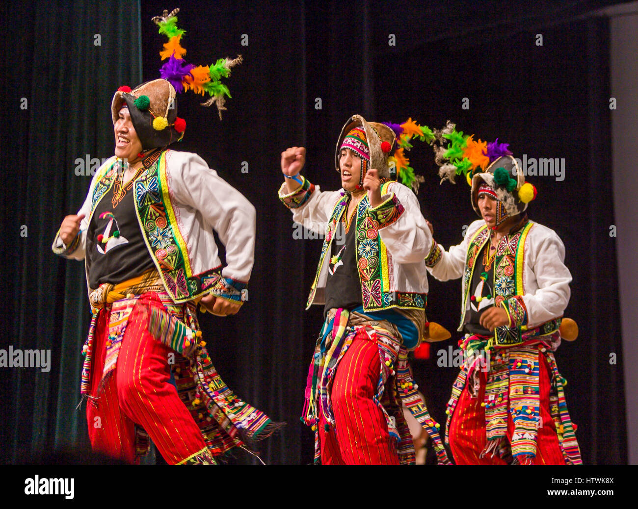 ARLINGTON, VIRGINIA, USA - Bolivian folk dancing group performs the Tinku dance during competition. Arlington has a large Bolivia immigrant community. Stock Photo