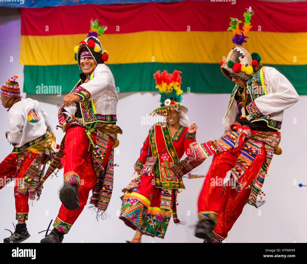 ARLINGTON, VIRGINIA, USA - Bolivian folk dancing group performs the Tinku dance during competition. Arlington has a large Bolivia immigrant community. Stock Photo