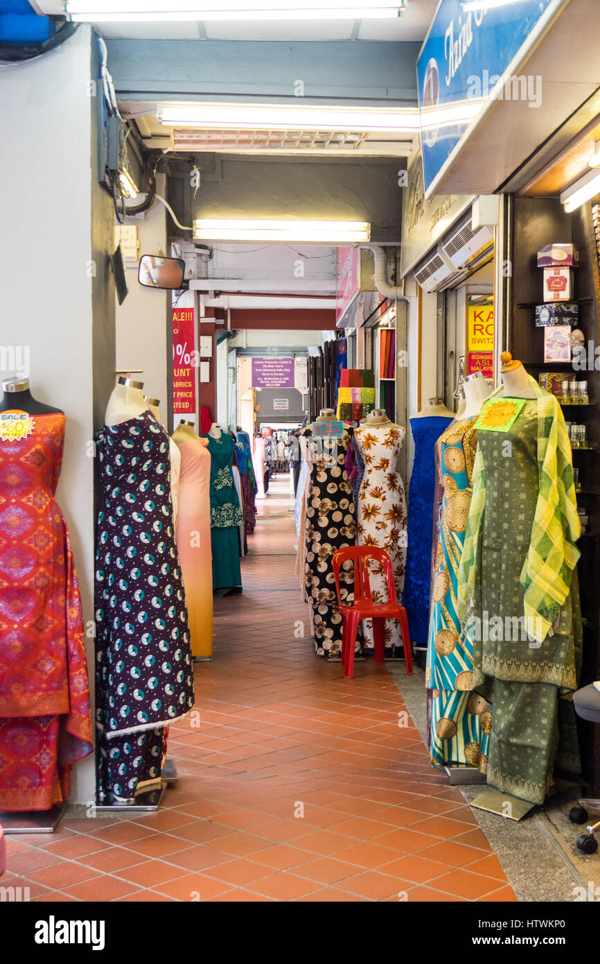 Mannequins dressed in fabrics on display in a fabric shop. Stock Photo