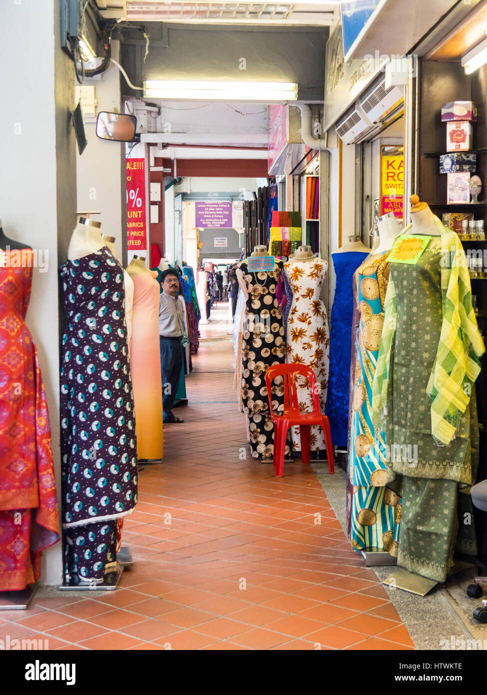 Mannequins dressed in fabrics on display in a fabric shop Stock Photo