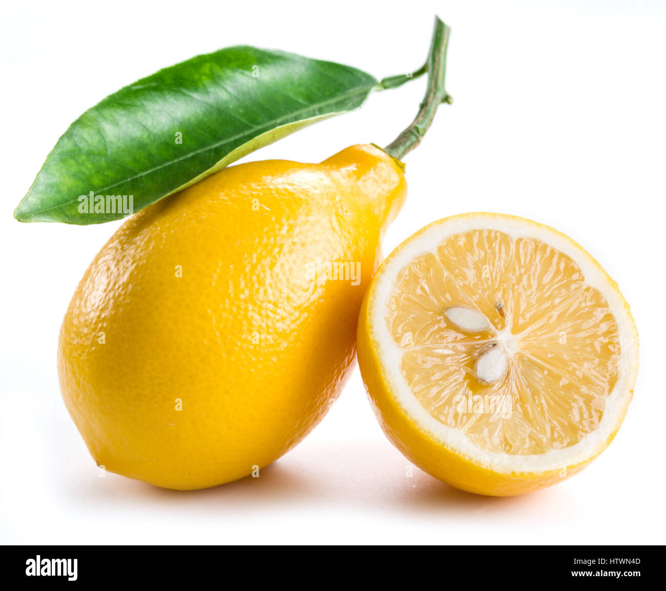 Ripe lemon fruits on the white background Stock Photo - Alamy