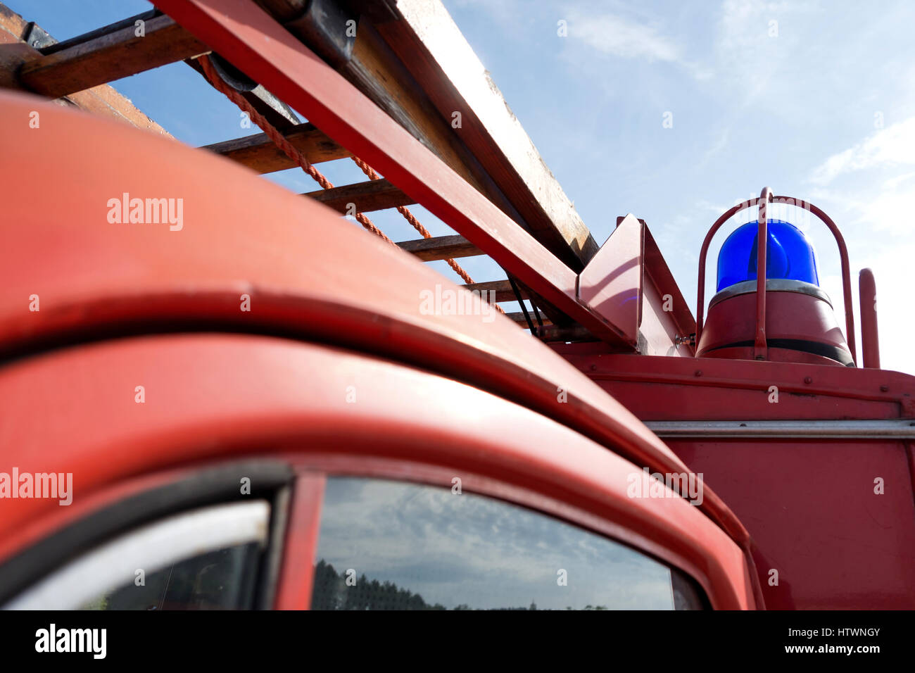 blue emergency vehicle lighting of a classic fire engine Stock Photo