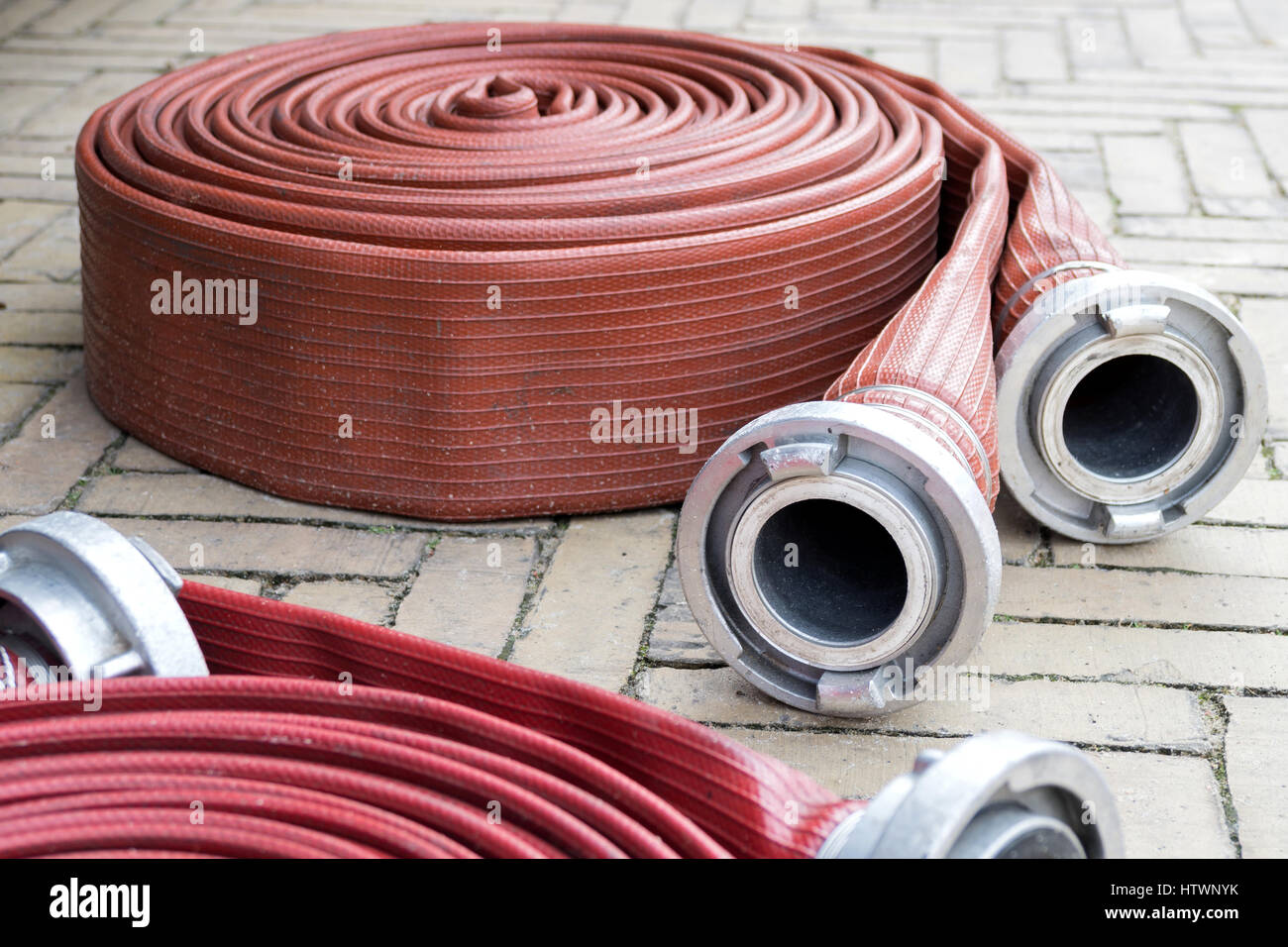 fire hoses with Storz couplings Stock Photo Alamy