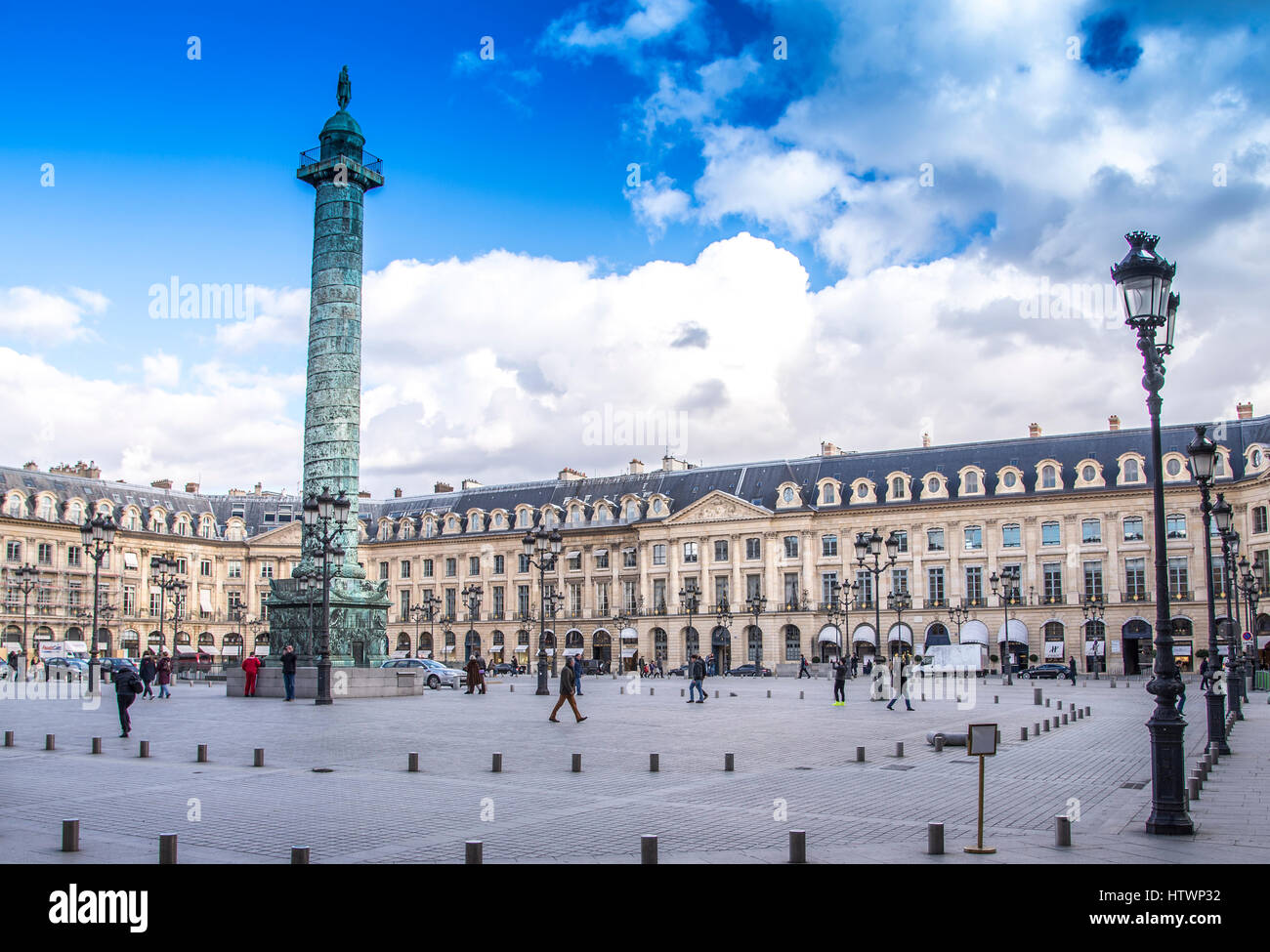 Place Vendôme with it's column in the center of the square surrounded by high end and fashionable shops. Stock Photo