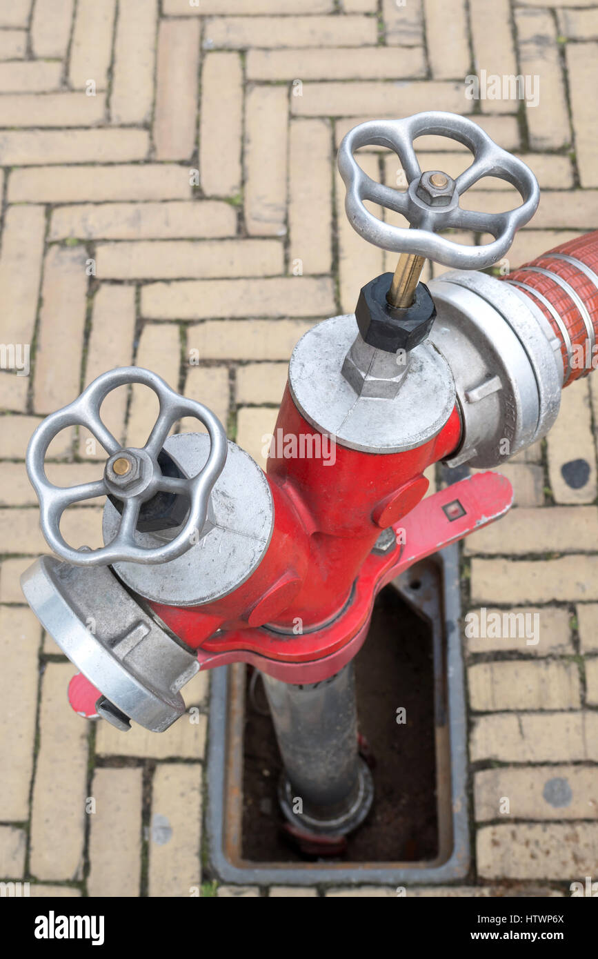 underground hydrant with Storz hose connections Stock Photo