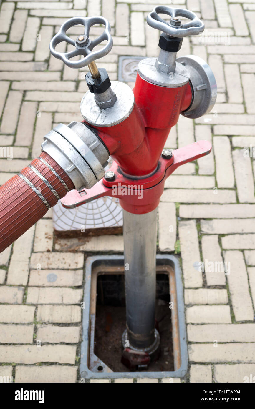 underground hydrant with Storz hose connections Stock Photo