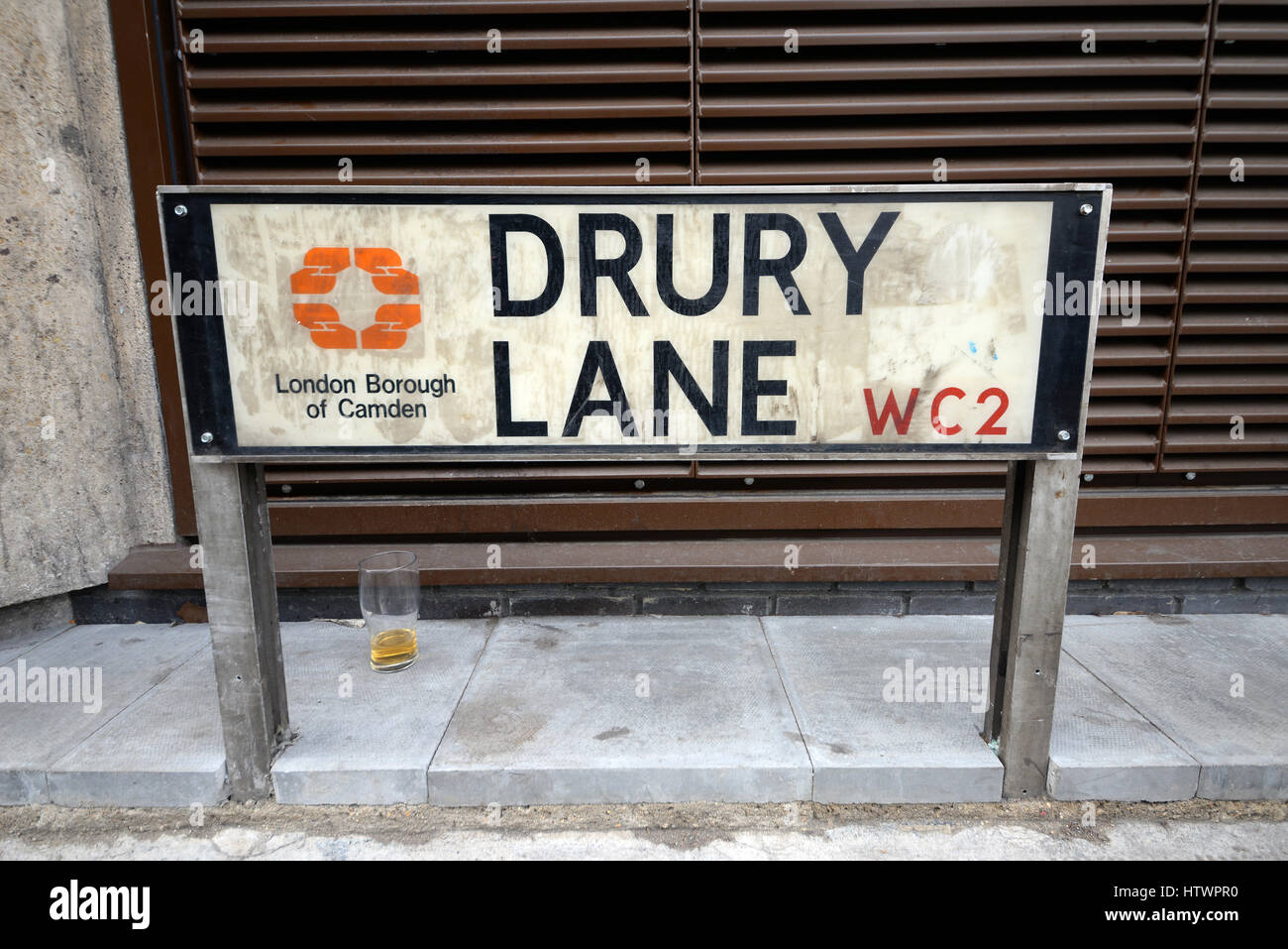Drury Lane is a street on the eastern boundary of the Covent Garden area of London, running between Aldwych and High Holborn. Unfinished drink left Stock Photo