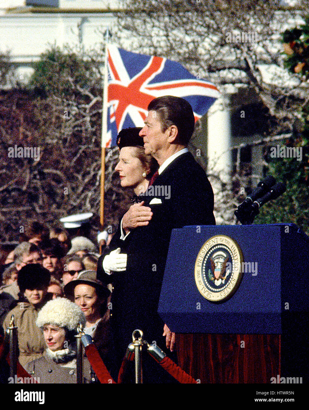 United States President Ronald Reagan welcomes Prime Minister Margaret Thatcher of Great Britain for her first official visit of his presidency on the South Lawn of the White House in Washington, D.C on Thursday, February 26, 1981 Thatcher died from a str Stock Photo