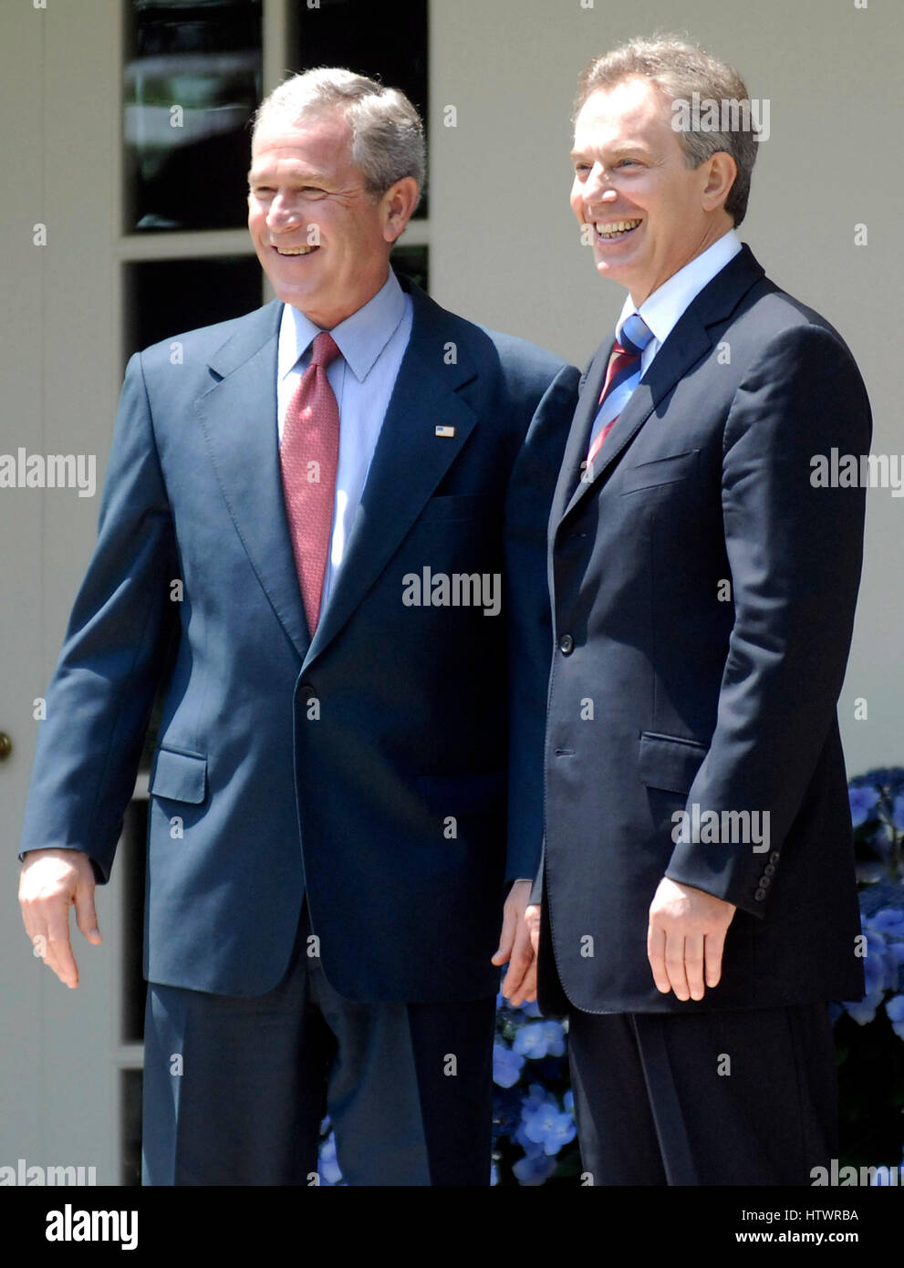 US President George W Bush (L) welcomes British Prime Minister Tony Blair to the White House for Lunch, in Washington on May 26, 2006 (UPI Photo/Kevin Dietsch Stock Photo