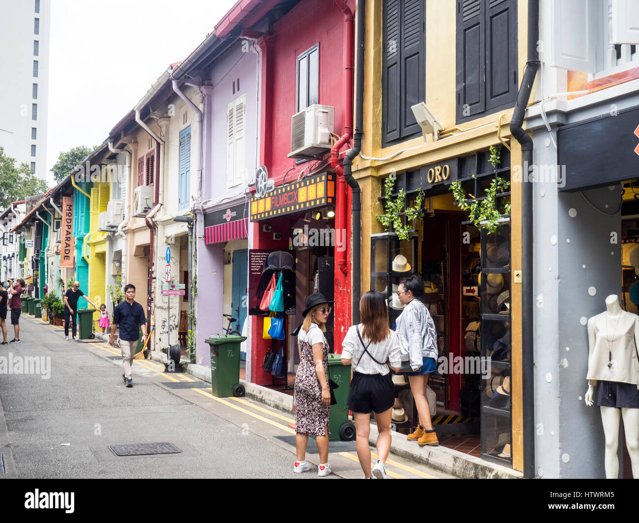 Shoppers and tourists walking along Haji Lane Singapore. Stock Photo