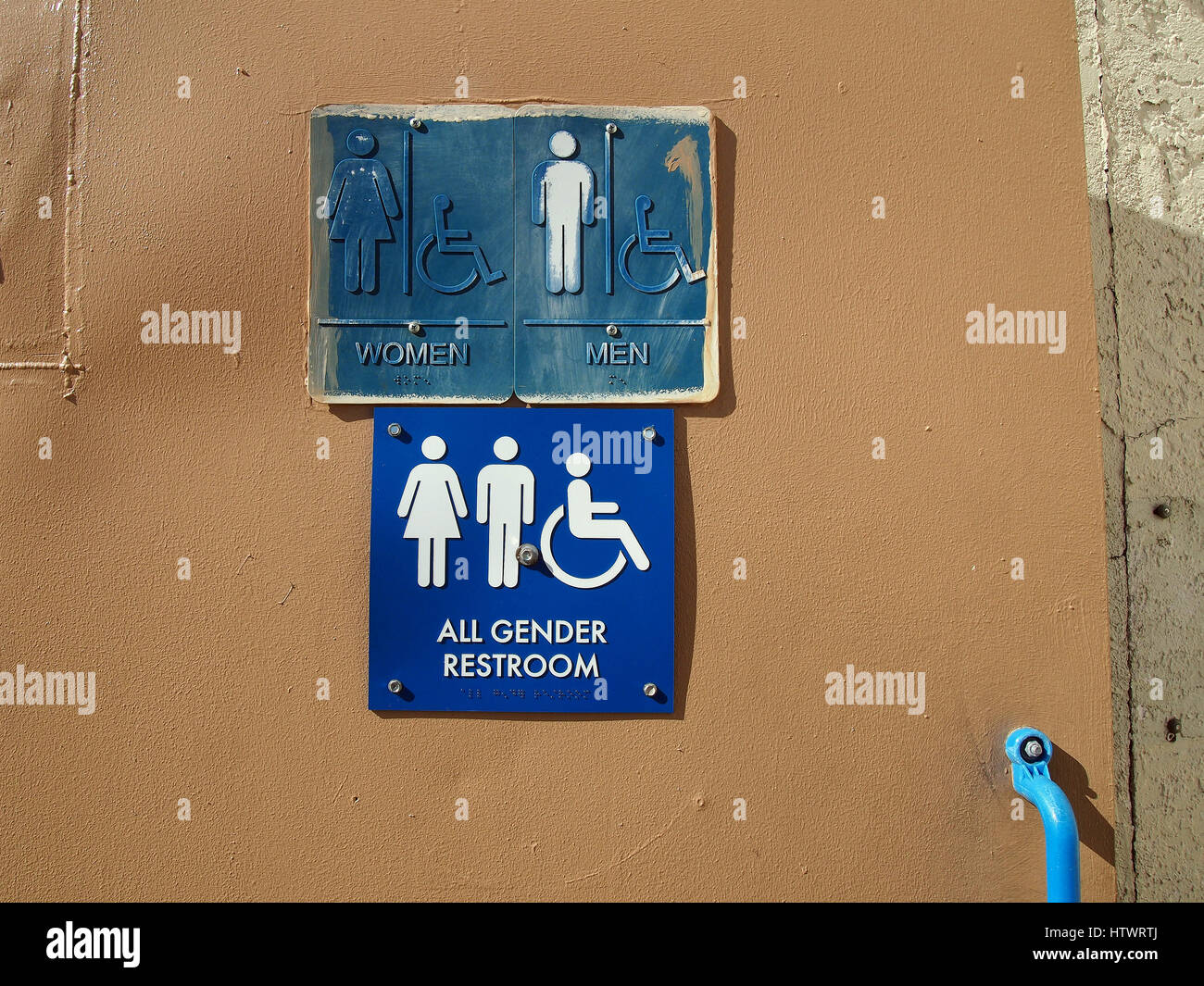 all gender restroom sign at gas station in California Stock Photo Alamy