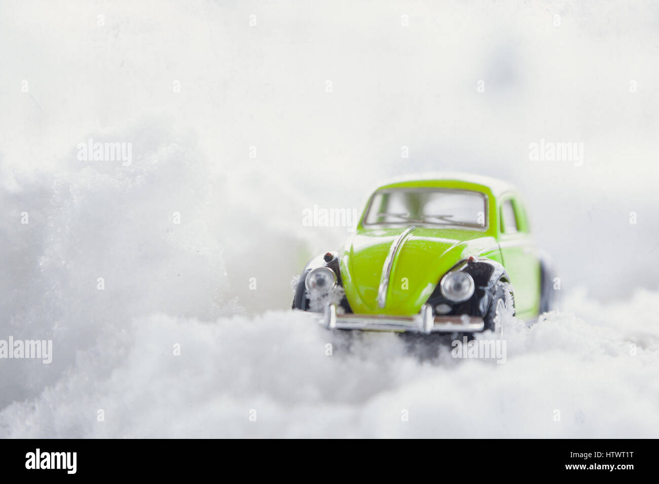 WOODBRIDGE, NEW JERSEY - March 14, 2017: A diecast toy Volkswagen Beetle stock in the snow Stock Photo
