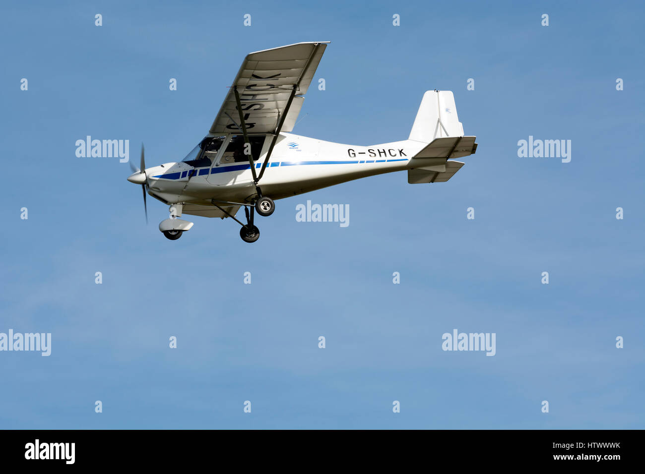 Ikarus C42 microlight at Staverton airfield, Gloucestershire, UK (G-SHCK) Stock Photo