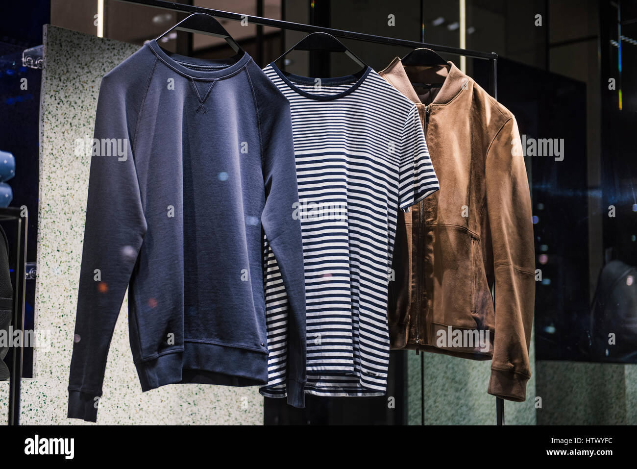 Men urban clothes on hangers Stock Photo Alamy