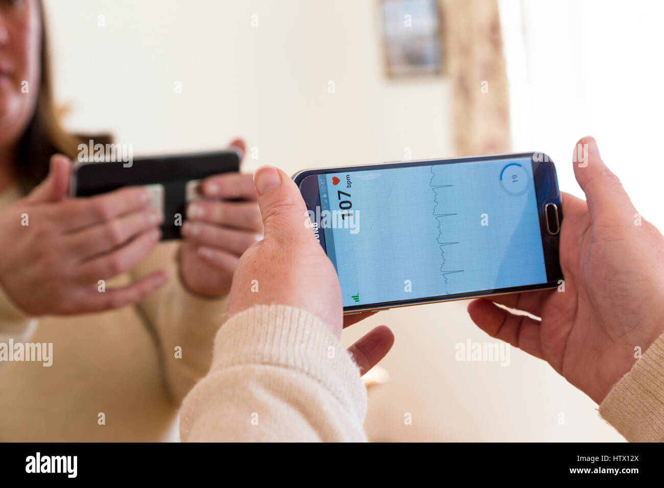 Kardia heart monitor app being used on a Samsung android phone Stock Photo