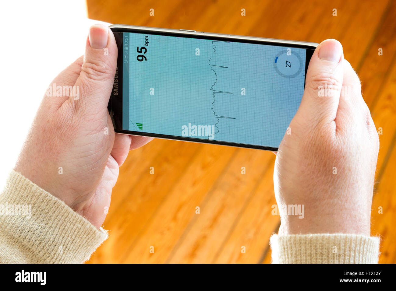Kardia heart monitor app being used on a Samsung android phone Stock Photo