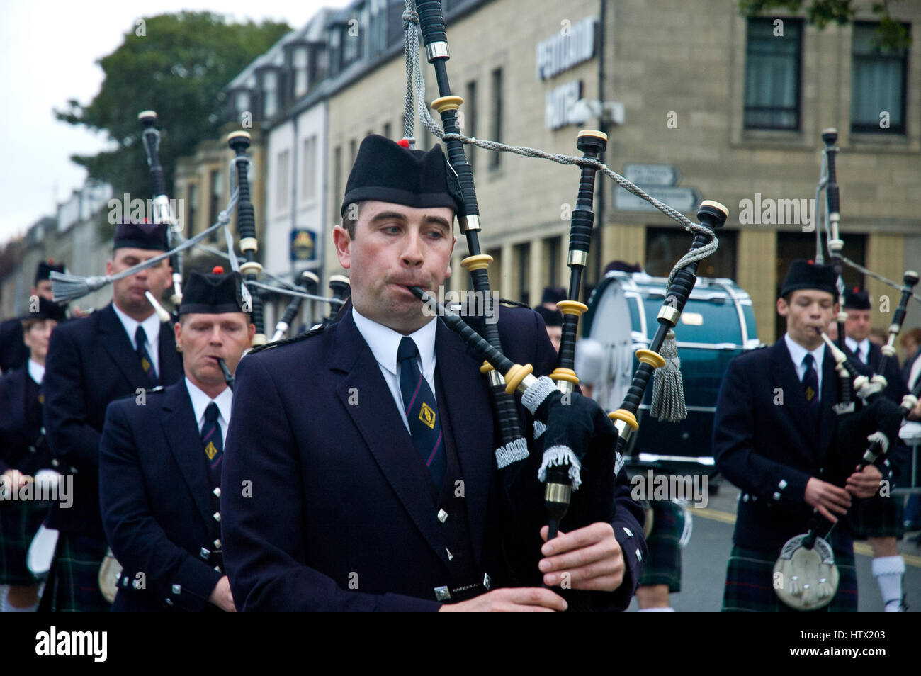 Scottish traditional bagpipes marching band on the street in Thurso Stock Photo Alamy
