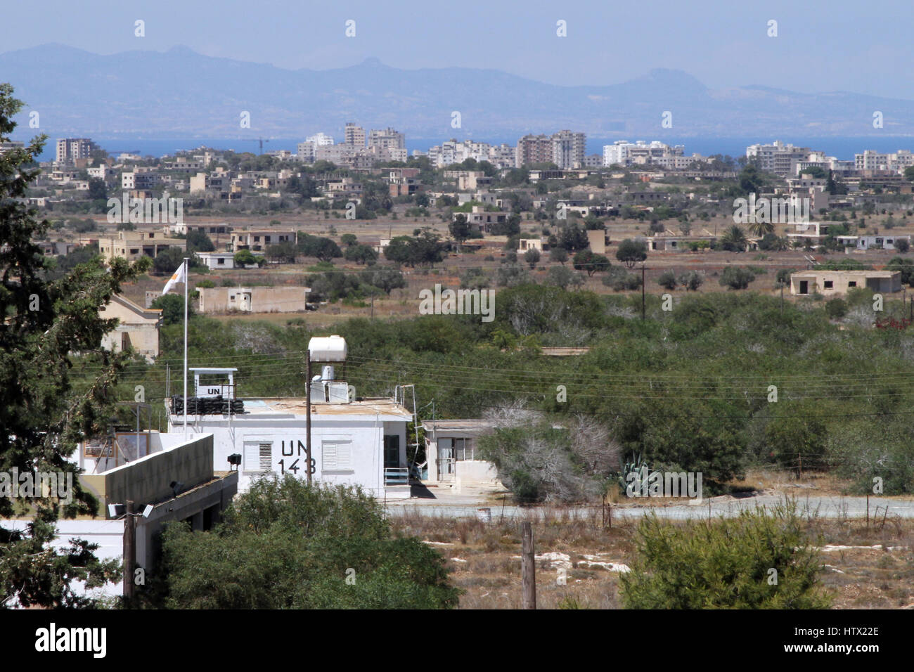 A UN post in the buffer zone between the Republic of Cyprus and the Turkish Republic of Northern Cyprus. The abandoned Varohsha is in the background. Stock Photo