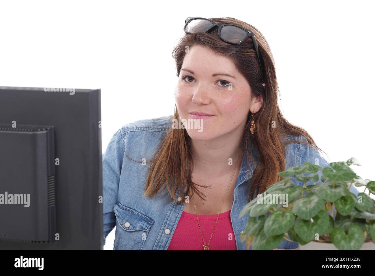 pretty young business woman working at pc in her office Stock Photo - Alamy