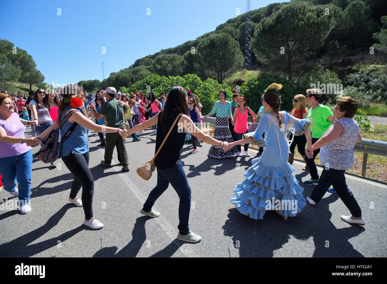 Group of people dancing at a local celebration in Villaviciosa, Cordoba, Spain Stock Photo