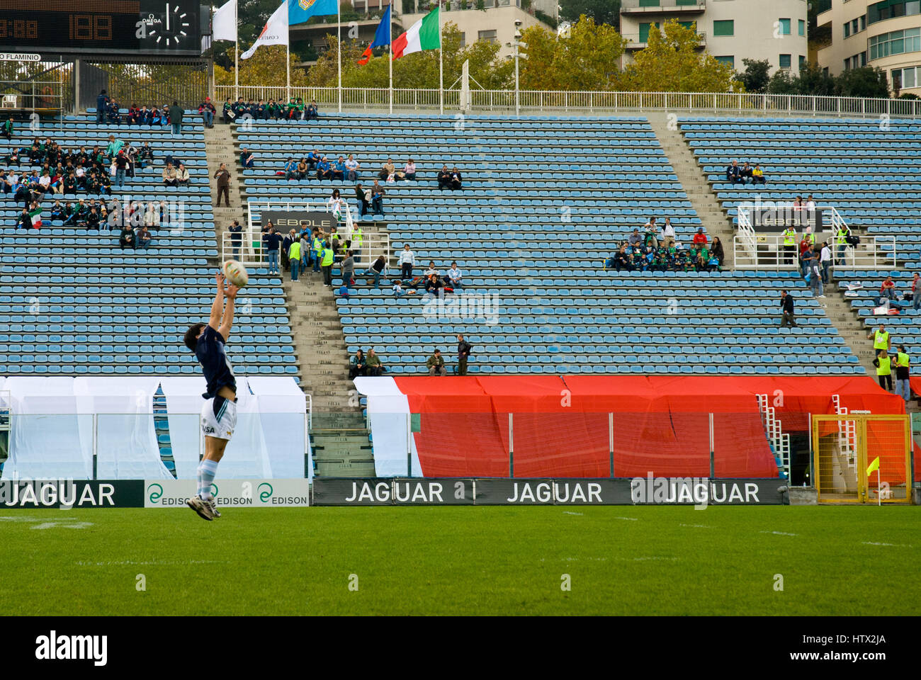 Rugby test match Italy-Argentina. Junior player on playground green field gallery in background Stock Photo