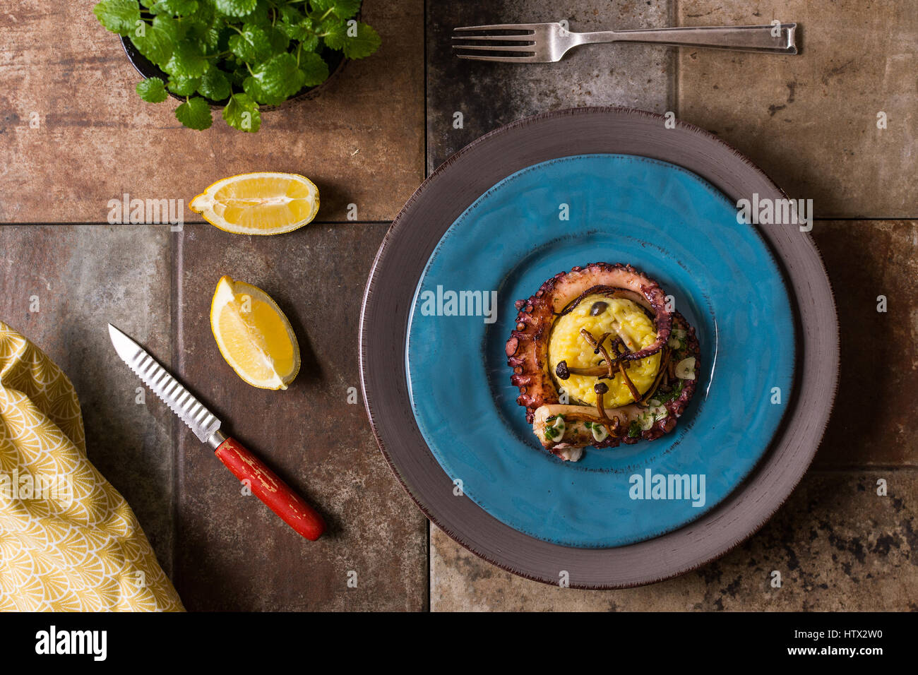 Grilled Seafood Octopus on Saffron Risotto with Brown Shimeji Mushrooms