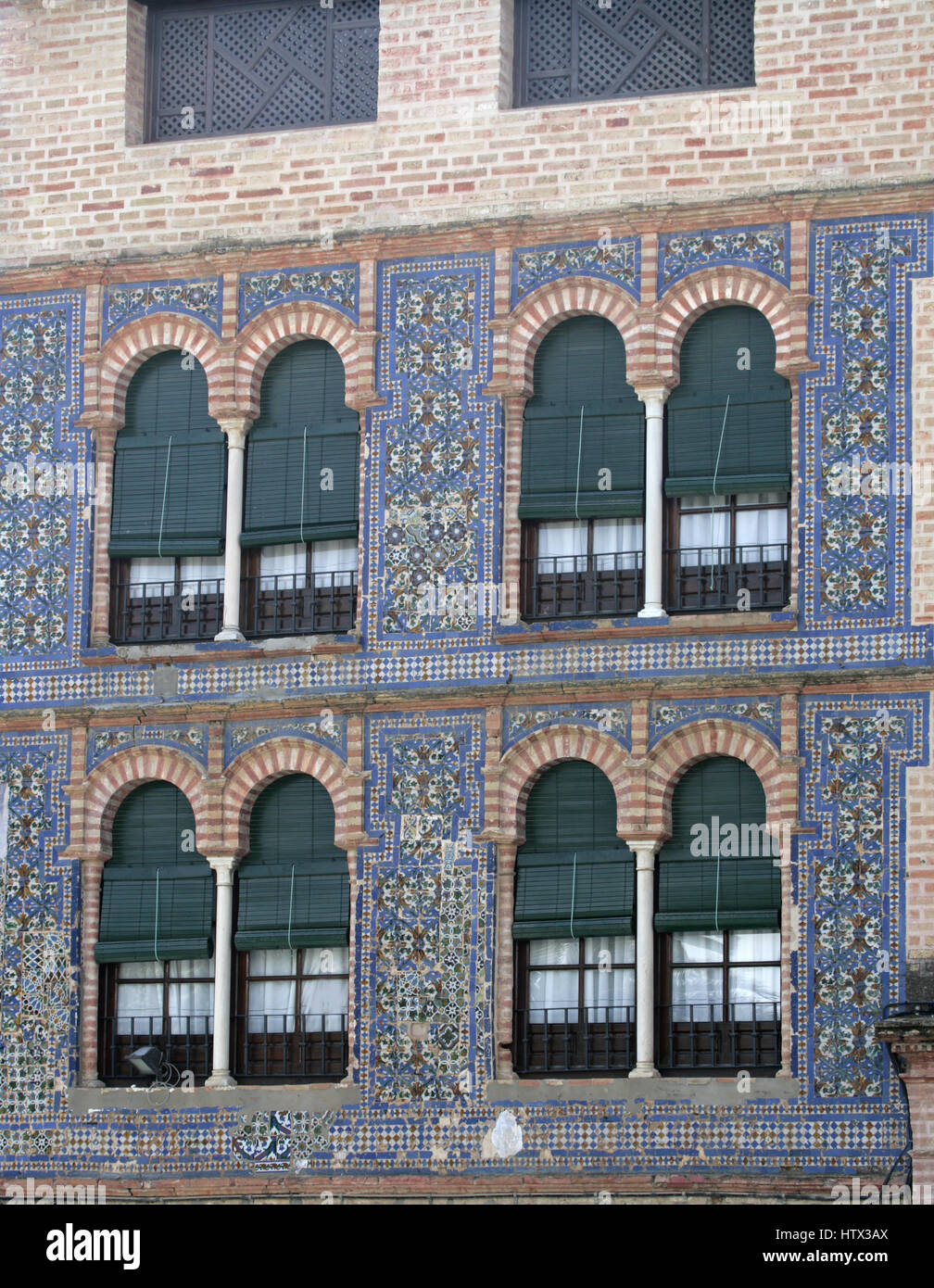 Architecture- Mudejar House frontage. Blue cuenca azuelos basin tile work, Plaza de San Fernando ,Carmona, Province of Seville, Andalusia, Spain. Stock Photo