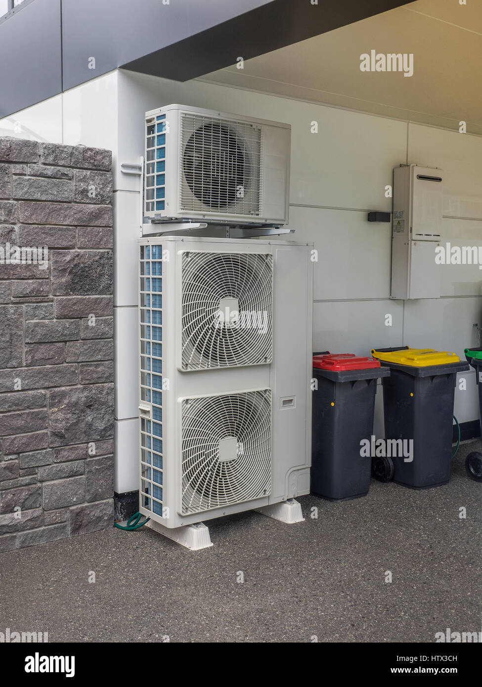 Air conditioning and heating units for a residential house Stock Photo