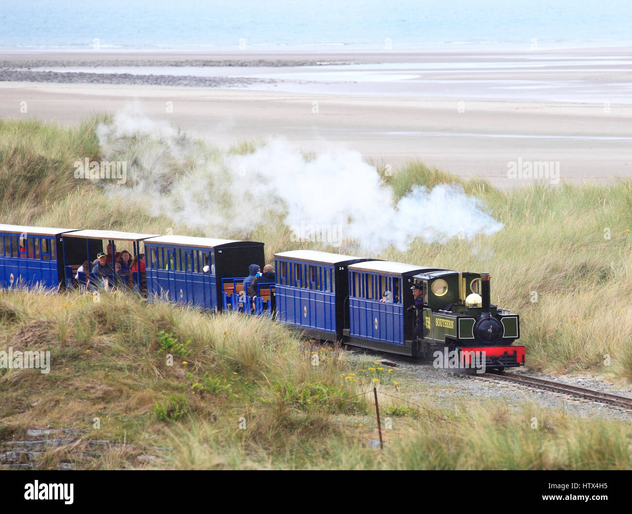 'Yeo' hauls a passenger train towards Penrhyn Point on the  Fairbourne Railway, Fairbourne, Wales, Europe Stock Photo