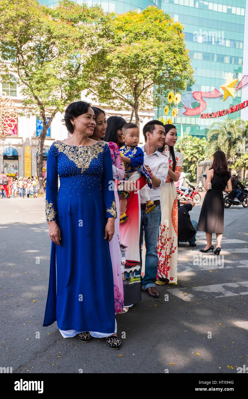 Vietnamese People in a street scene during the Lunar New Year(Tet) Holiday, Ho Chi Minh City, Vietnam Stock Photo