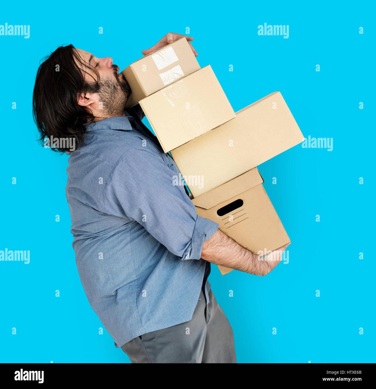 Man Carrying Box Parcel Package Overload Stock Photo