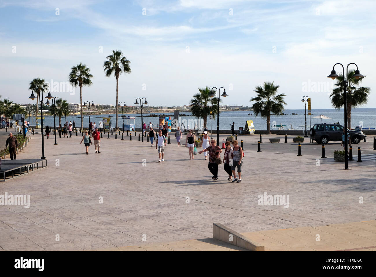 Holiday makers on the seafront at Pafos, Western Cyprus. Stock Photo