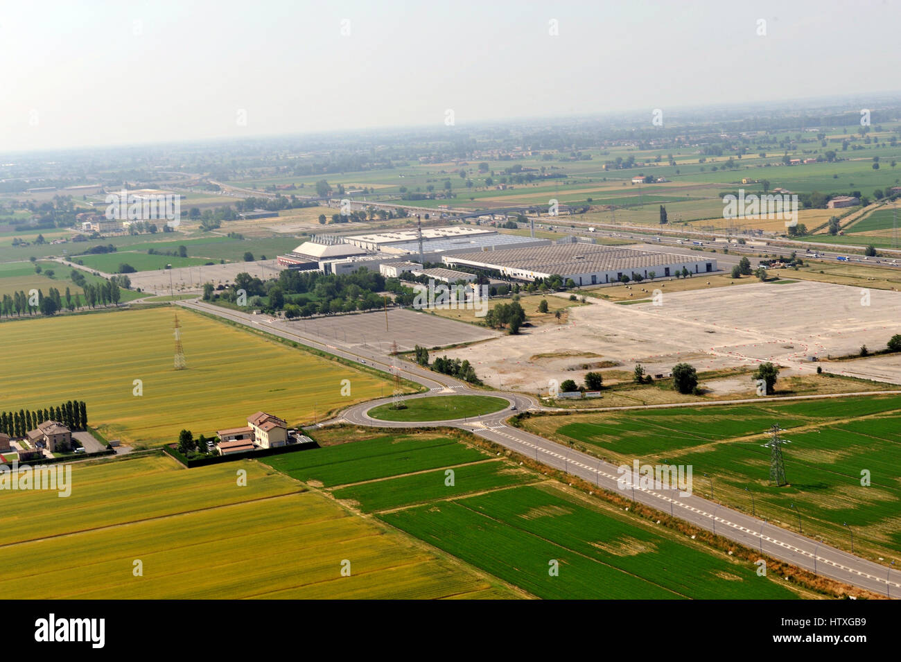 Aerial view, of new shopping center,  mall, condominium construction close to Parma, Emilia Romagna, Italiy, highway, A1 Stock Photo