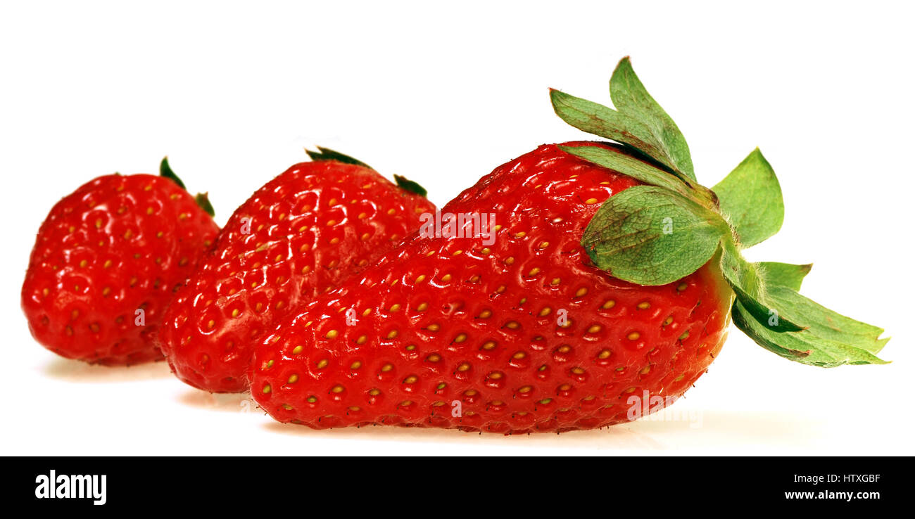 Group of people eating strawberries hi-res stock photography and images ...