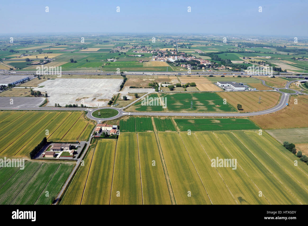 Aerial view, of new shopping center,  mall, condominium construction close to Parma, Emilia Romagna, Italiy, highway, A1 Stock Photo