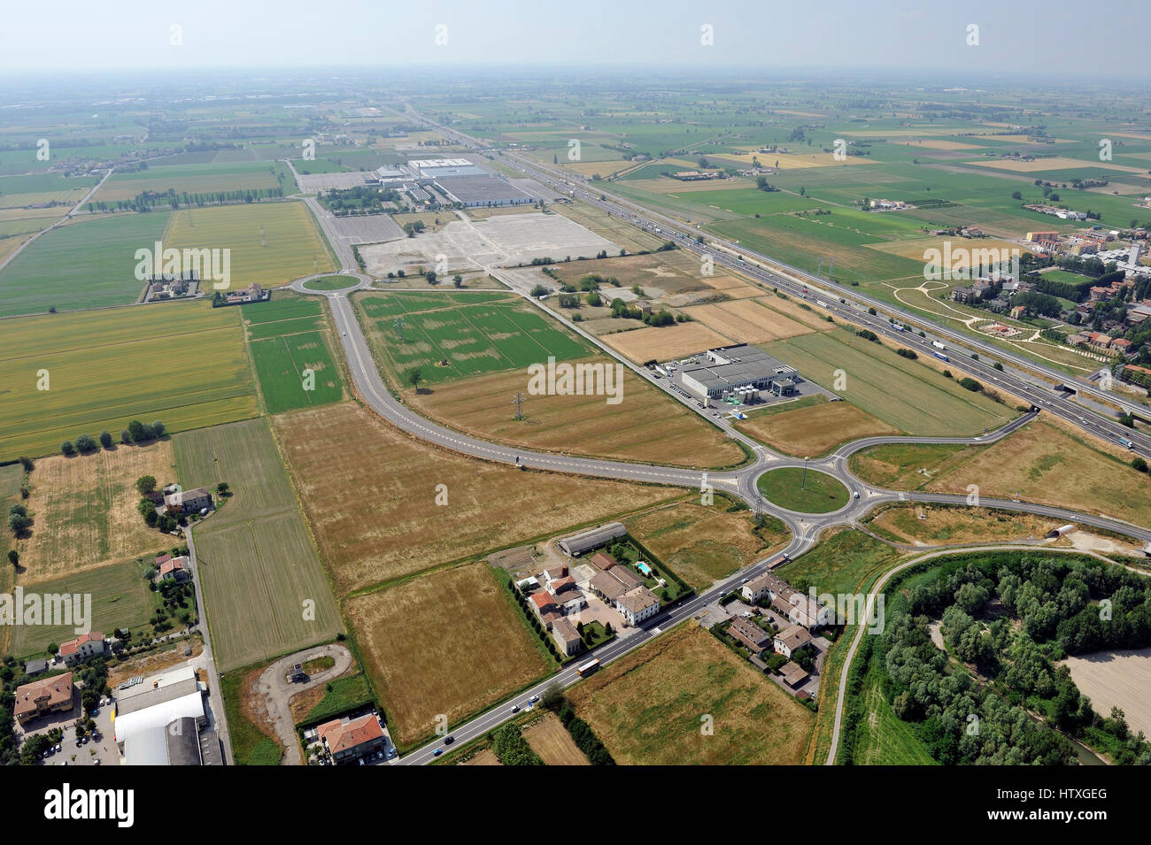 Aerial view, of new shopping center, 	 mall, condominium construction close to Parma, Emilia Romagna, Italiy, highway, A1 Stock Photo