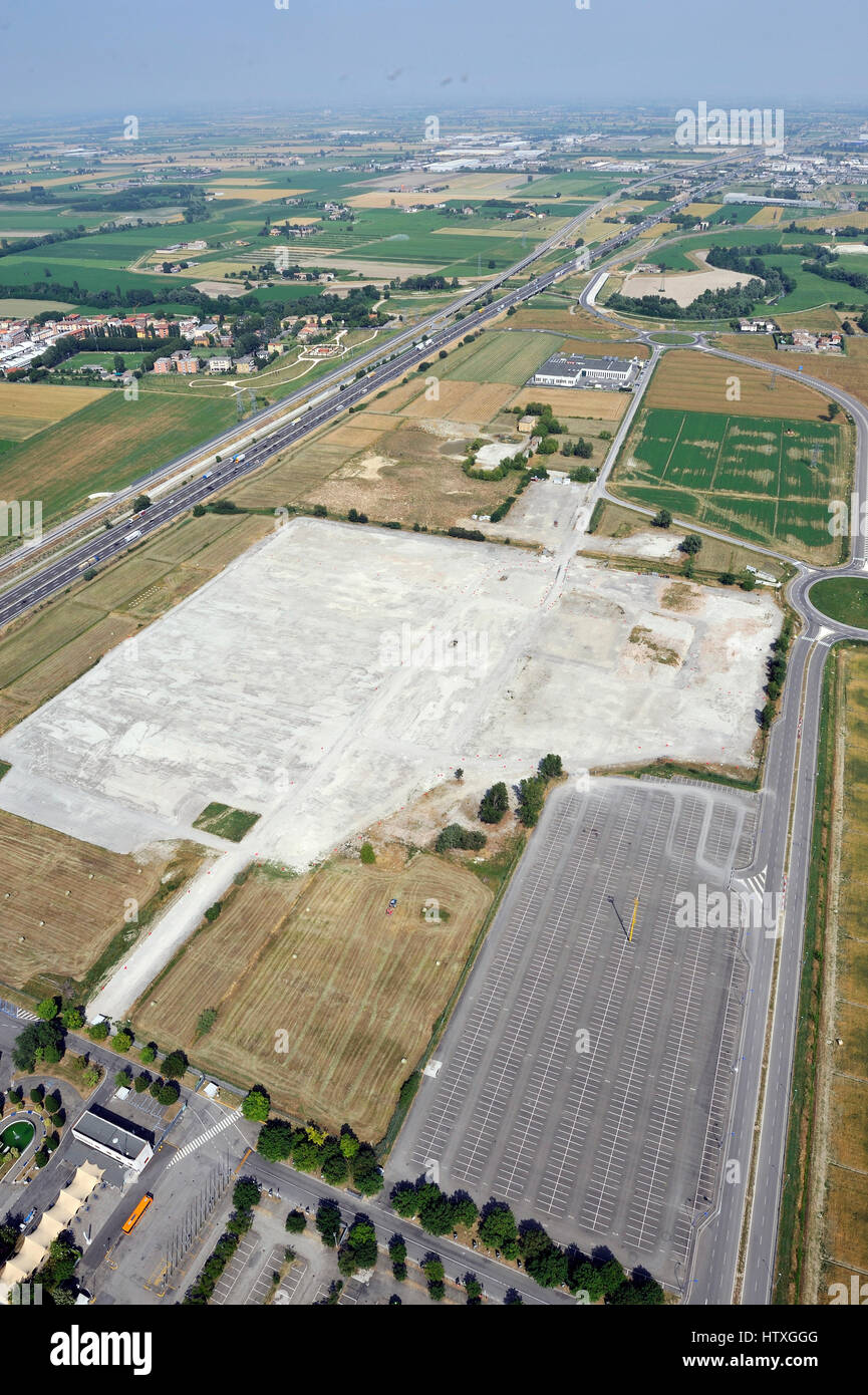 Aerial view, of new shopping center,  mall, condominium construction close to Parma, Emilia Romagna, Italiy, highway, A1 Stock Photo